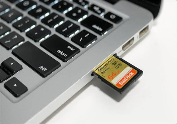 Insert the SD card into your Macs built-in slot